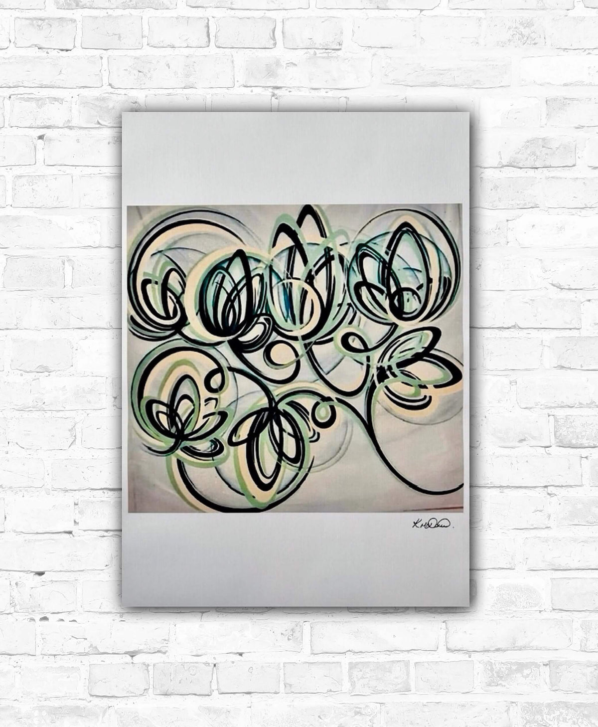Modern art prints featuring swirls of black, green, and orange lines on a white background, signed by an artist.