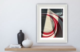 Framed abstract artwork on paper with a white and red swirl pattern. Sold unframed in sizes A4 and A3.