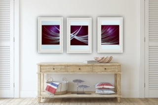 Three framed abstract artworks displaying  a minimalistic symbolic design in a red and white colour way.   Sold by Uk abstract artist.