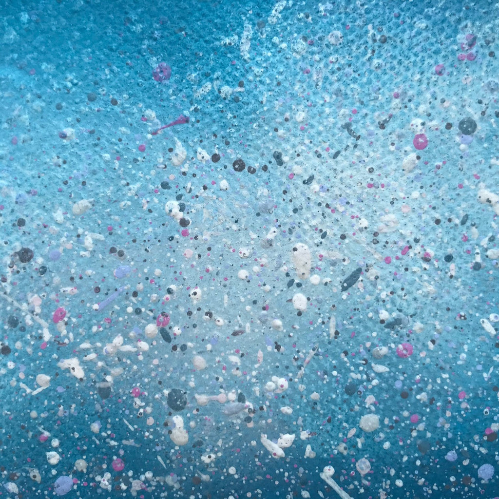 Pink and blue mixed media textured piece of art.