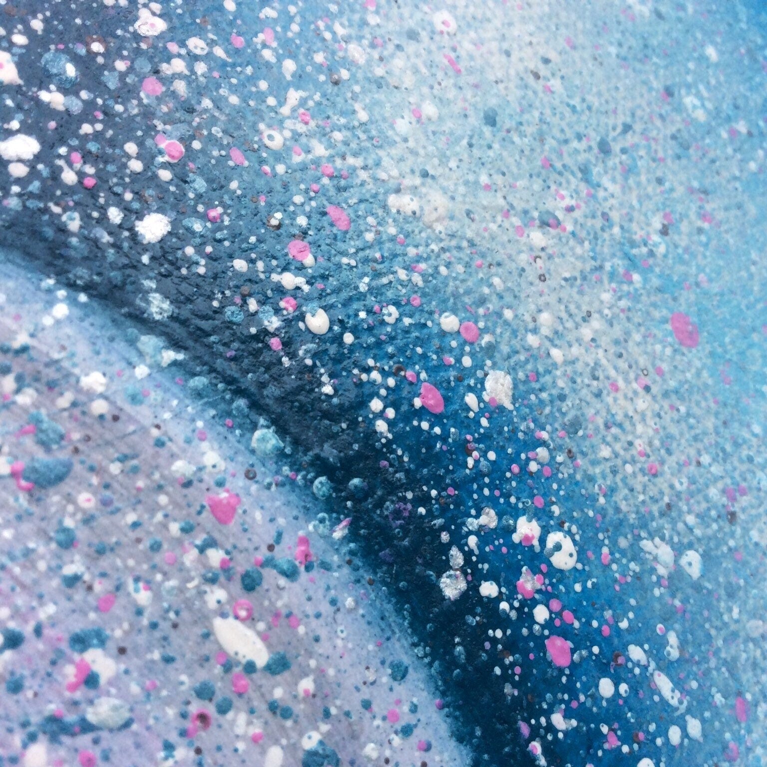 Pink and blue mixed media painting.