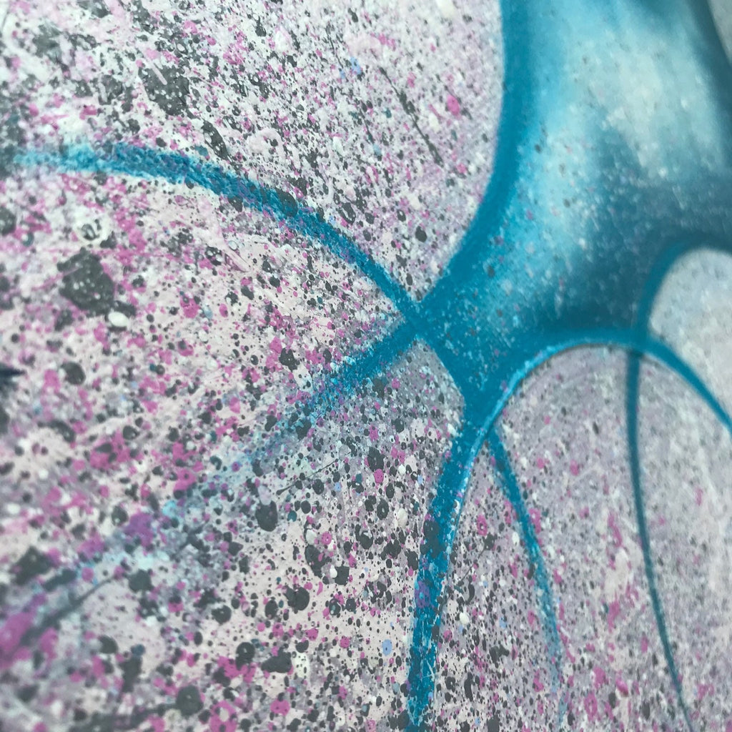 Abstract textured piece of art on canvas.