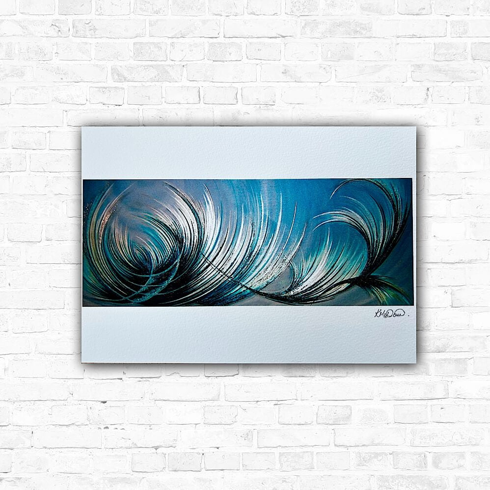 Blue abstract art featuring swirling blue and white textures, signed by the artist on the lower right corner, displayed on a white brick wall background.