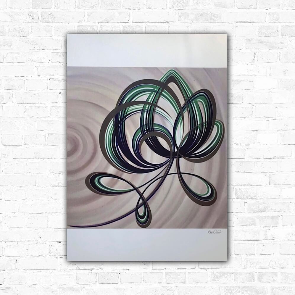 A flower print depicting a stylized flower with black and green lines on a gray background, displayed against a white brick wall.