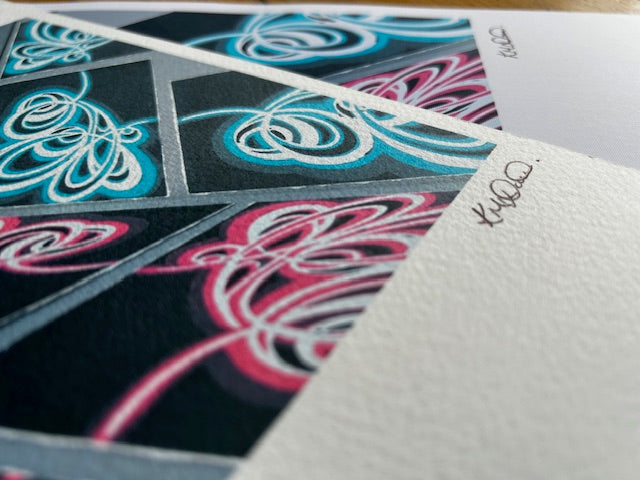 Two colourful art prints signed by the artist.