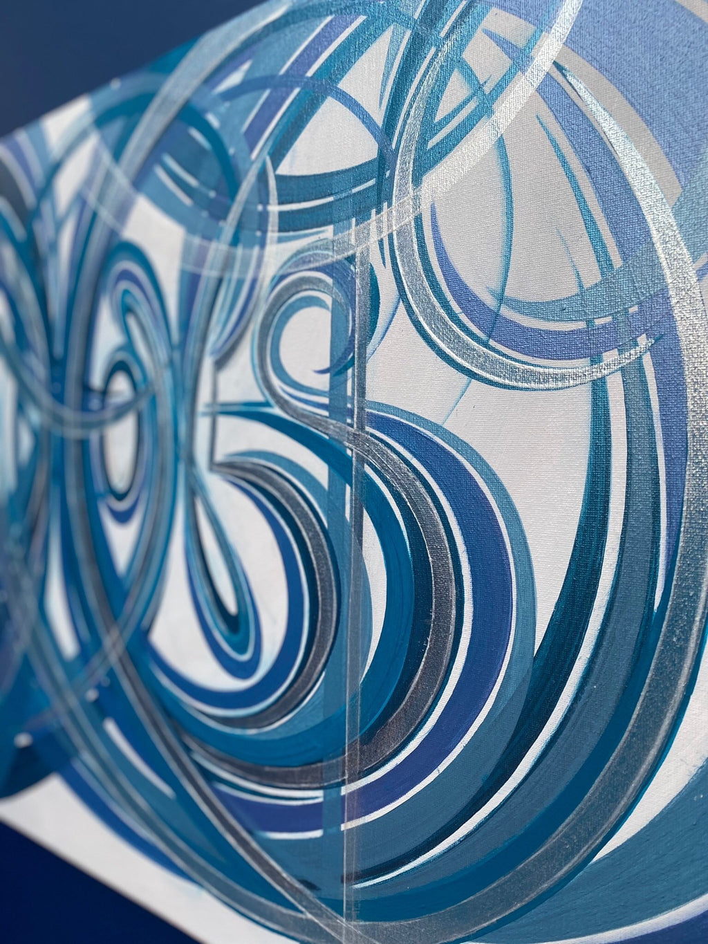Unique word artwork on canvas.