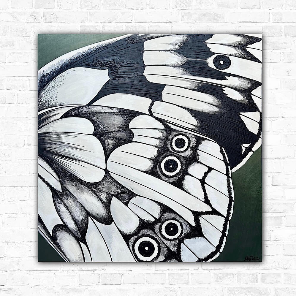 A black, white, and cream hand-painted butterfly wall art on canvas with textured details.