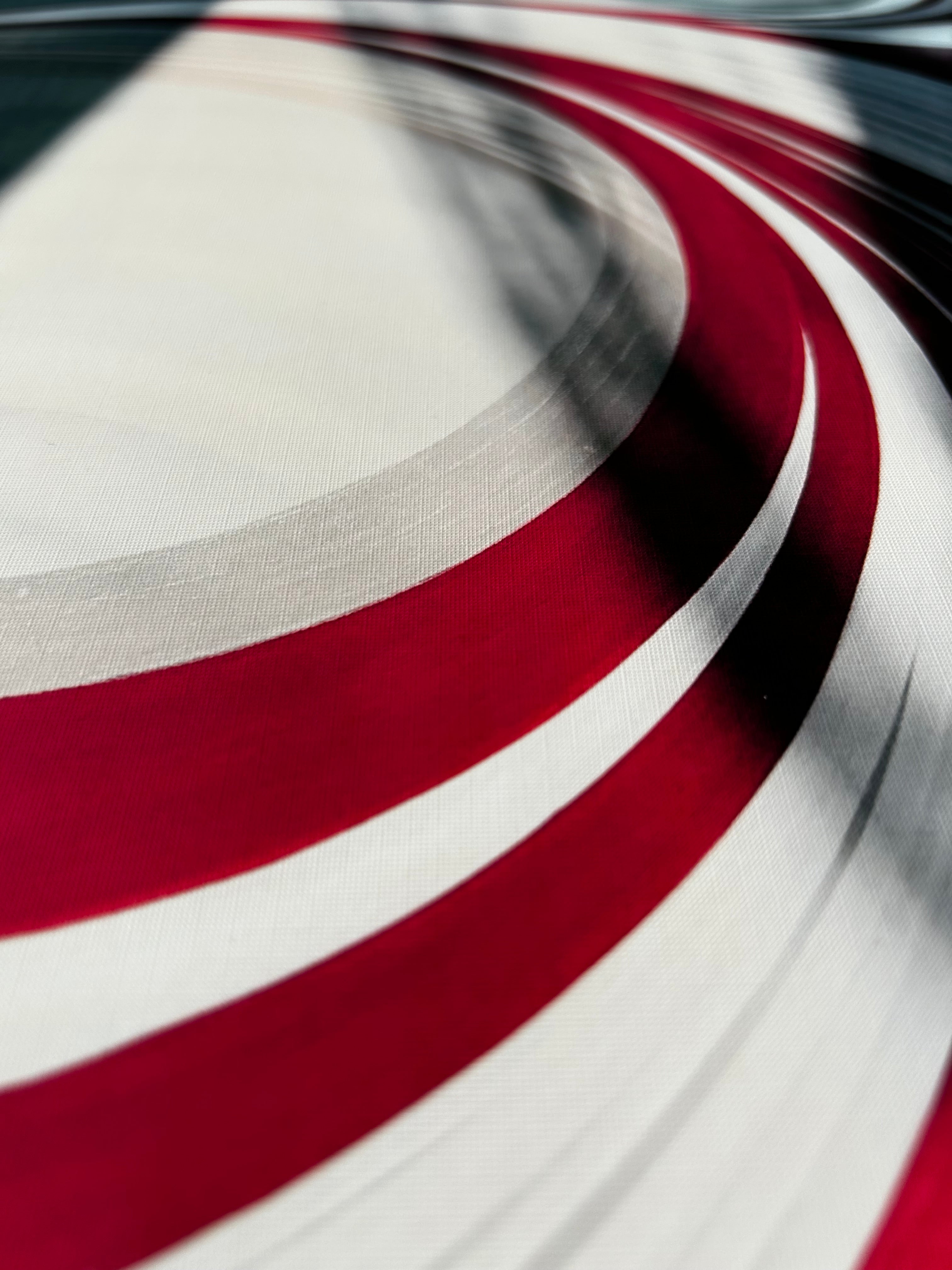 Close-up of a white and red modern pattern art print from independent UK business.