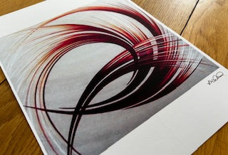 Abstract art piece on a white background with a colourful orange and white pattern.